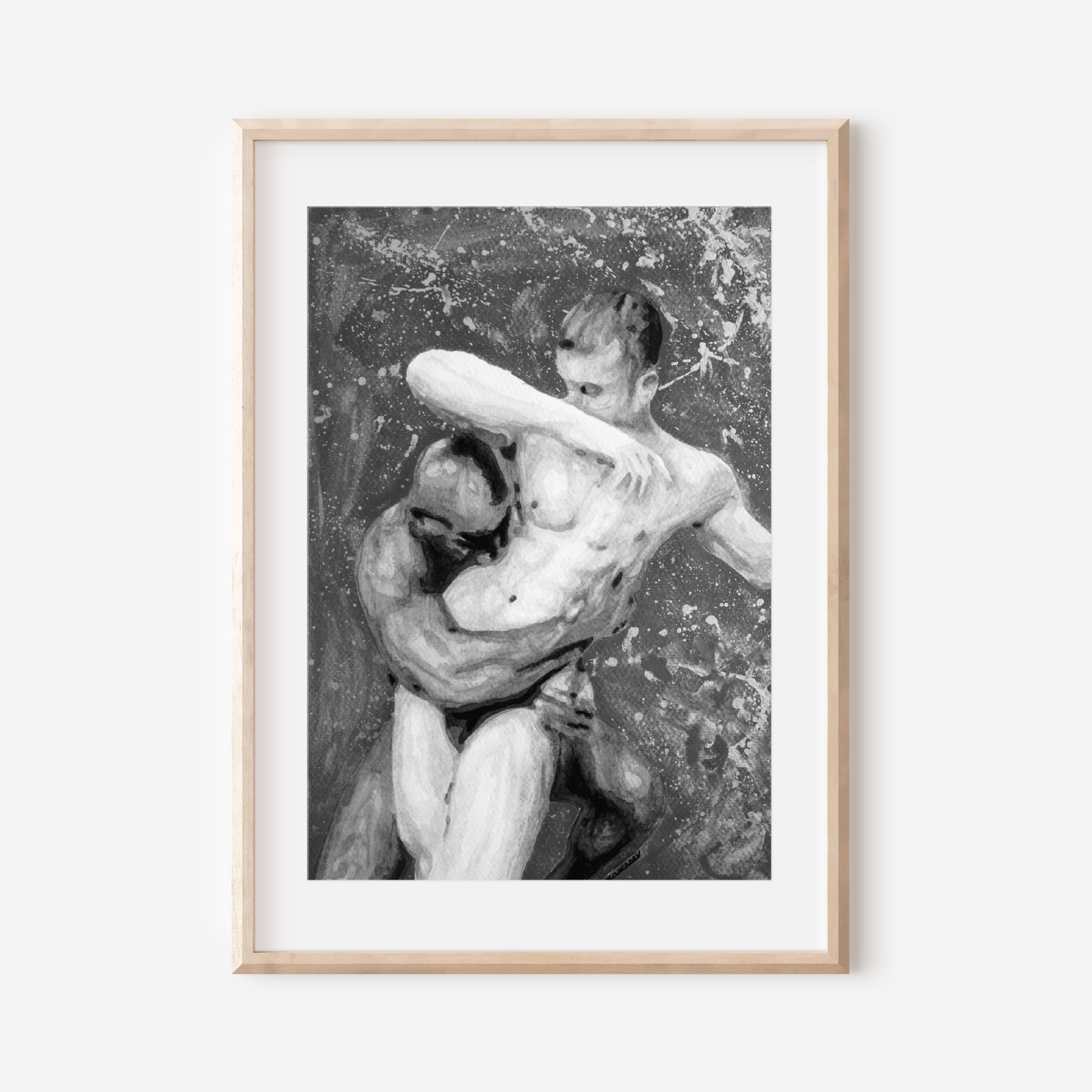 Framed black and white artwork of two nude figures embracing on a white background