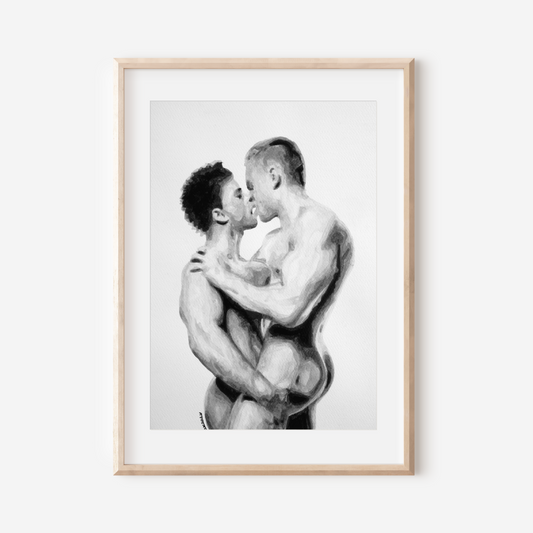 Framed black and white artwork of two men embracing on a white background