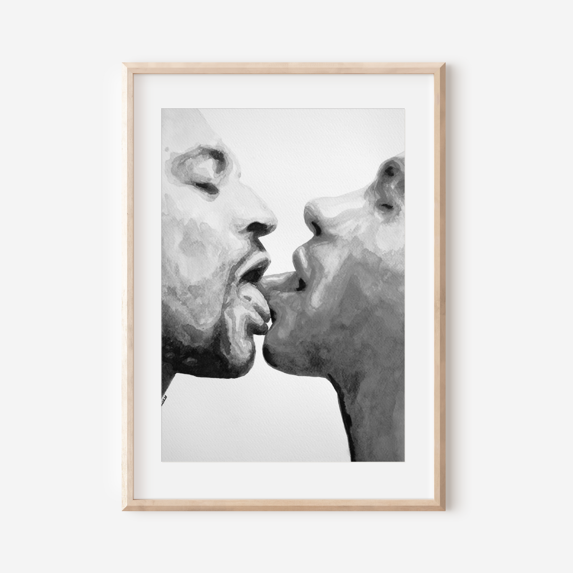 Framed black and white artwork of two faces close together on a white background