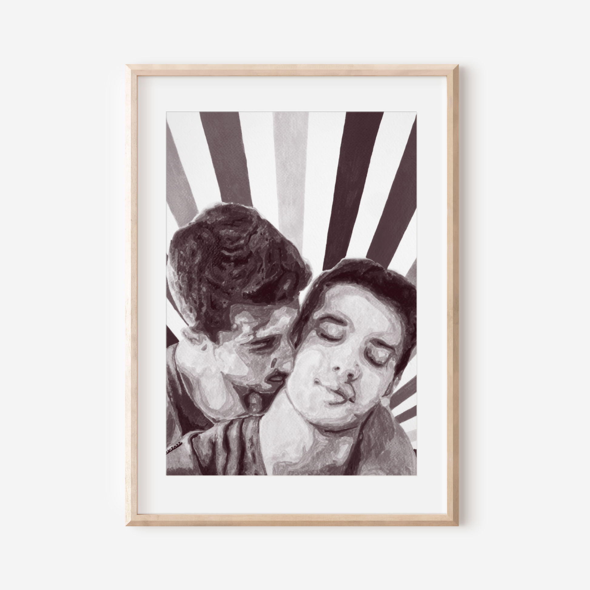 Framed black and white artwork of two people embracing on a white background