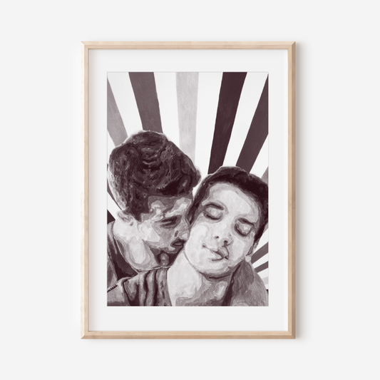 Framed black and white artwork of two people embracing on a white background