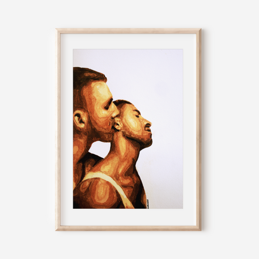 Framed artwork of two profiles on a white wall