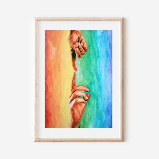 Framed artwork of two hands holding each other against a rainbow background