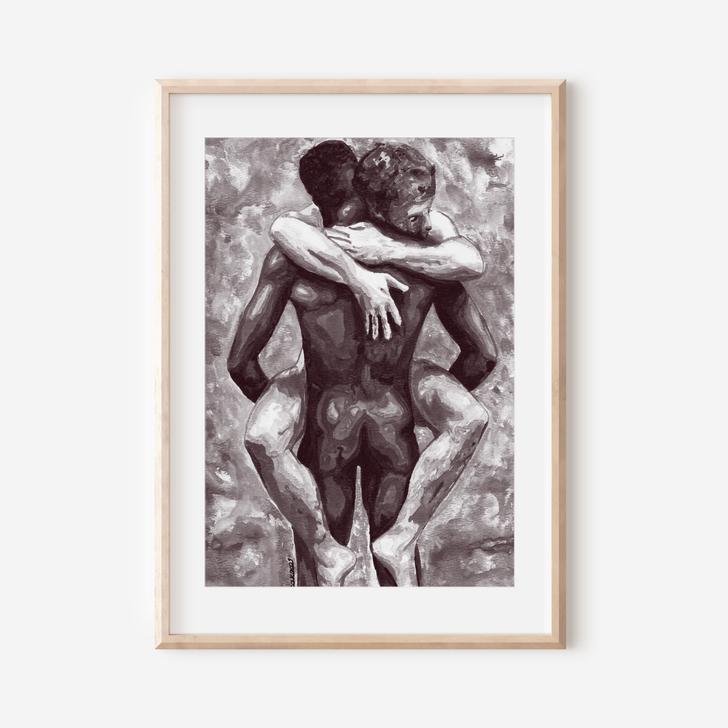 Framed artwork of two nude figures embracing on a white wall.