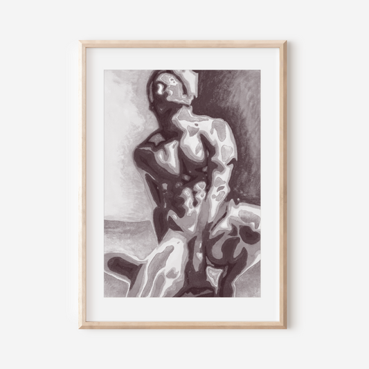 Framed black and white artwork of a nude figure on a white wall