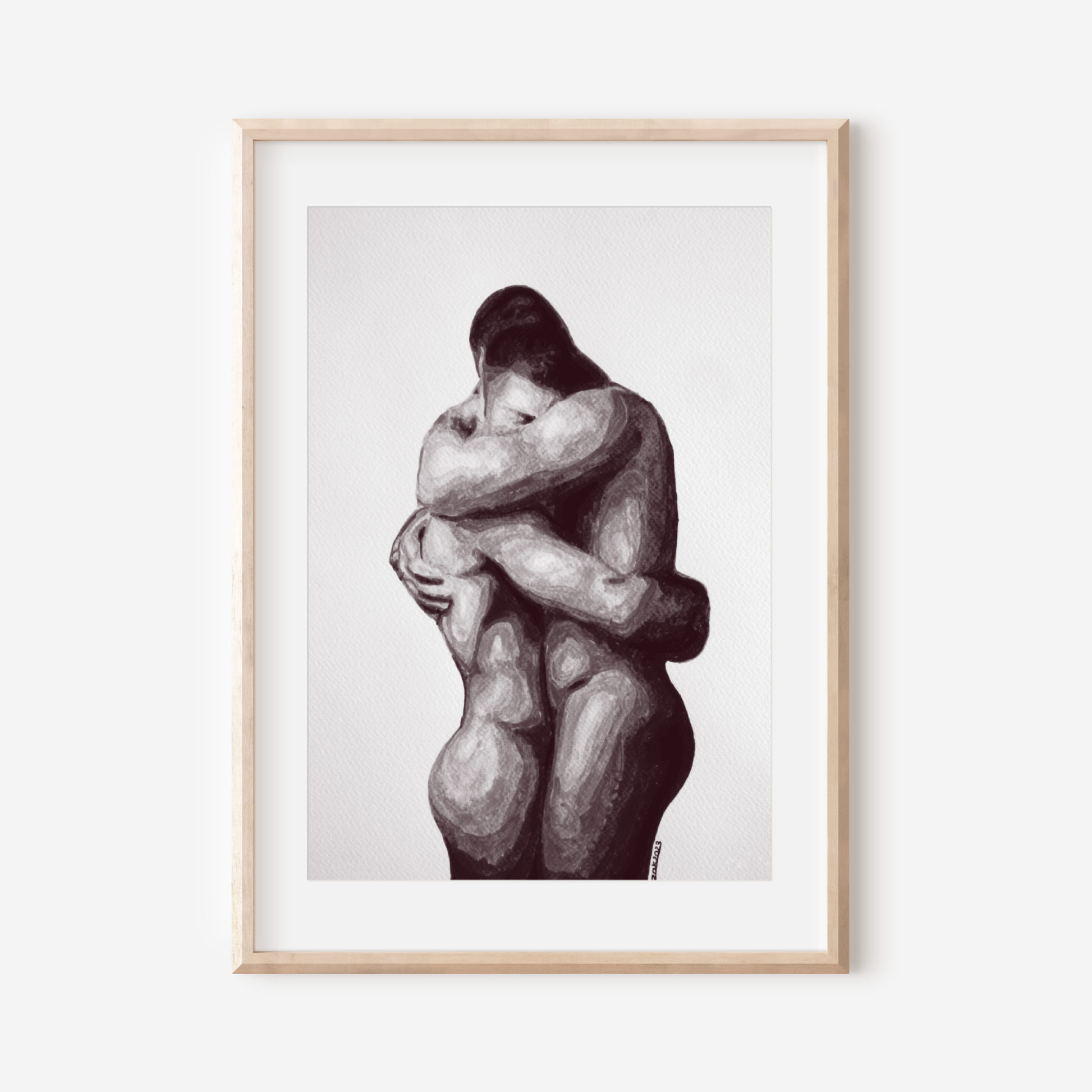 Framed artwork of two abstract human figures embracing on a white background