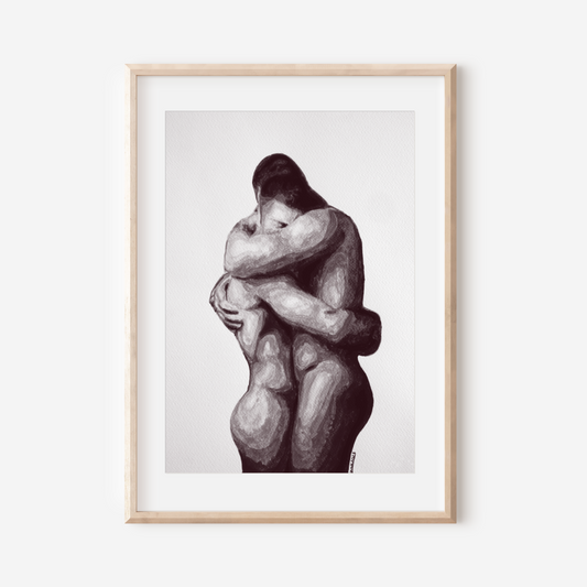 Framed artwork of two abstract human figures embracing on a white background