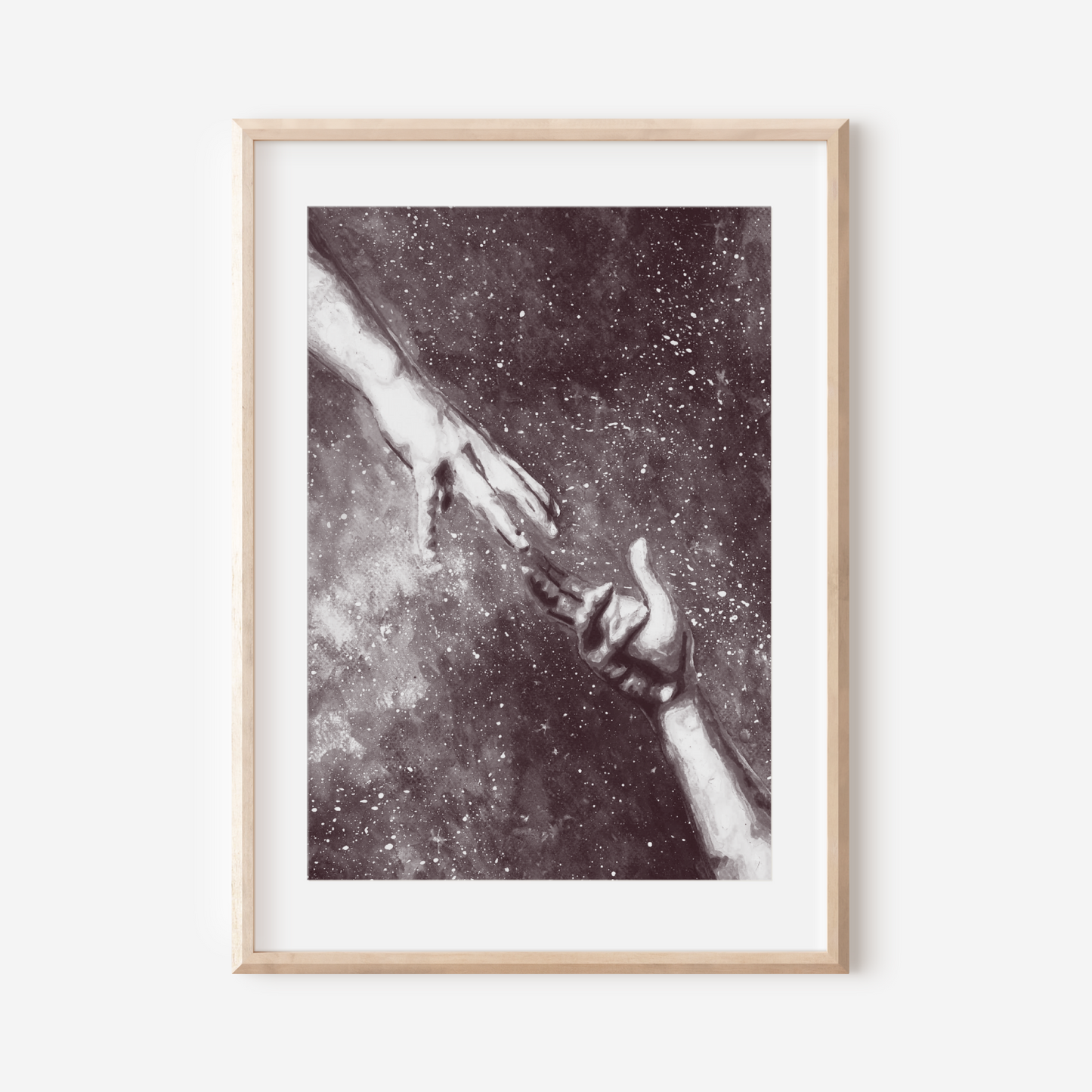 Framed artwork of two hands reaching towards each other against a starry background.