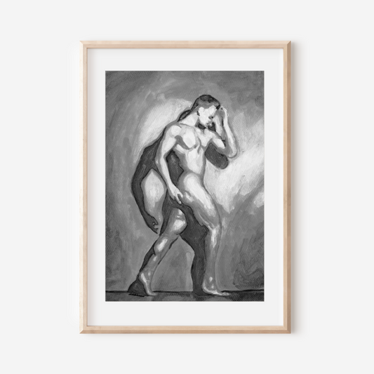 Framed artwork of a nude figure on a white wall