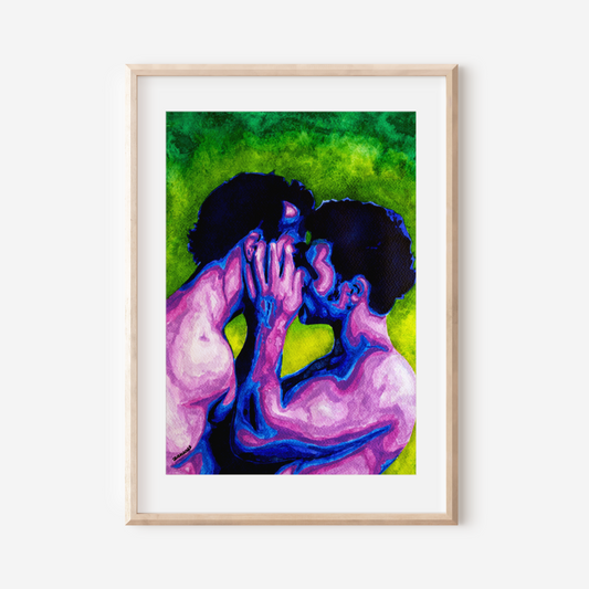 Framed artwork of two people embracing with a colorful background on a white wall.