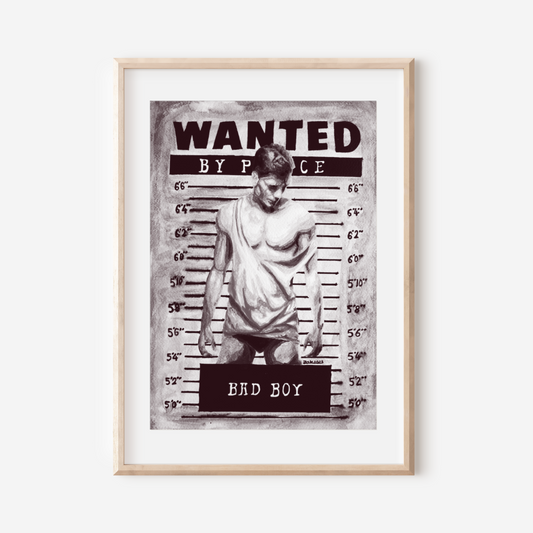 Framed 'Wanted' poster with a person in a mugshot style on a white background