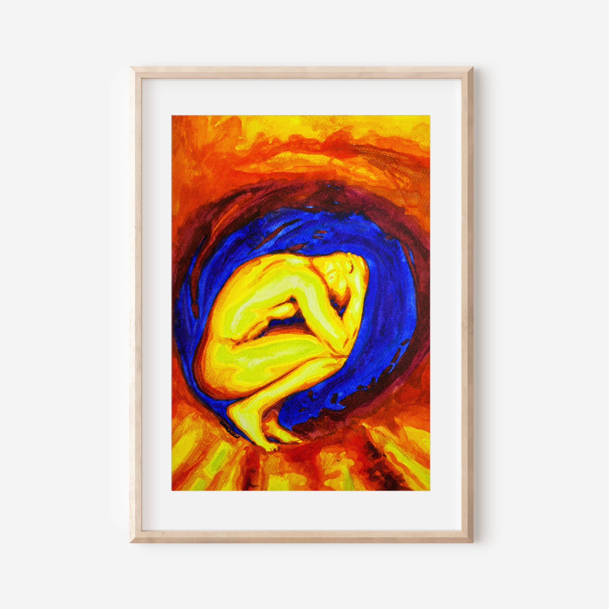 Framed abstract artwork with warm colors on a white wall