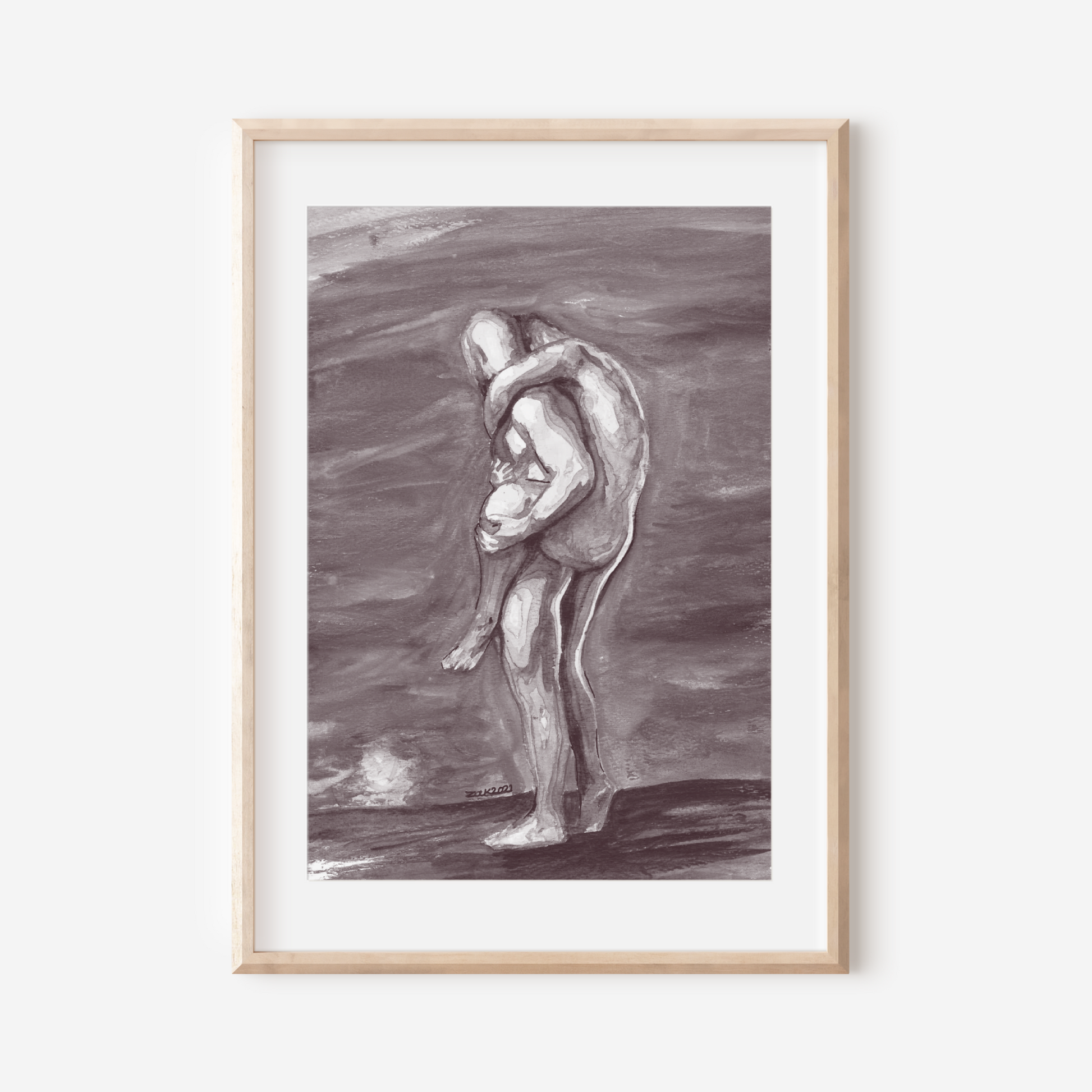 Framed artwork of a nude figure holding a child on a white wall