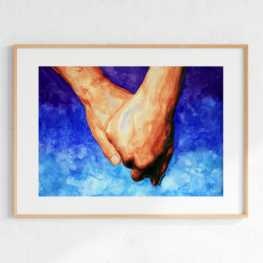 Framed artwork of two hands holding each other against a blue background