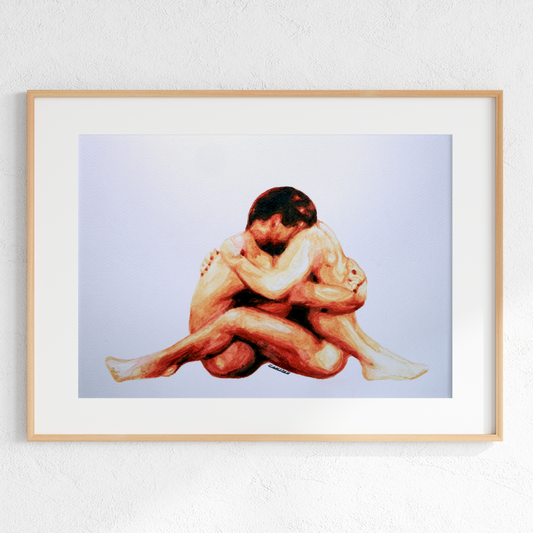 Framed artwork of two people embracing on a light gray background