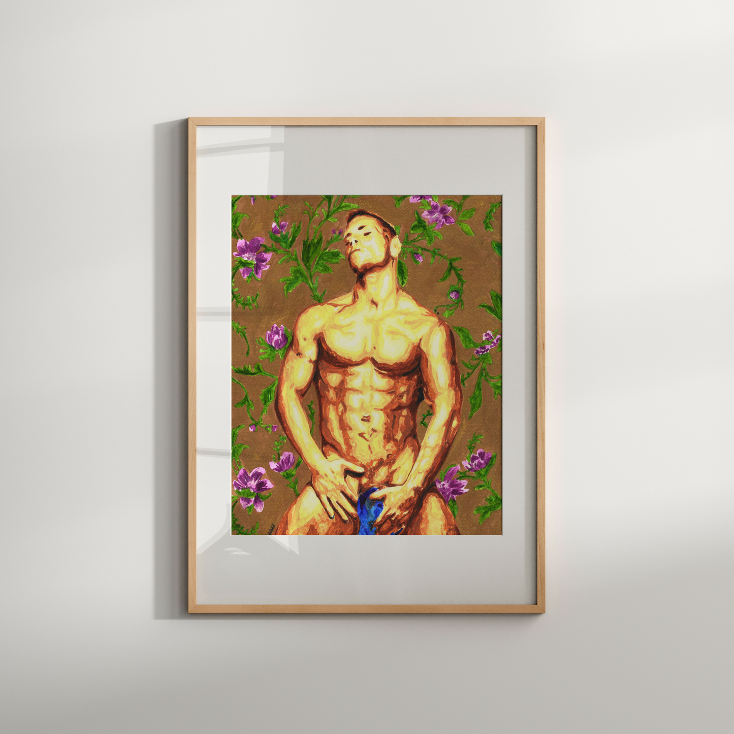 Framed artwork of a shirtless man with flowers on a plain wall