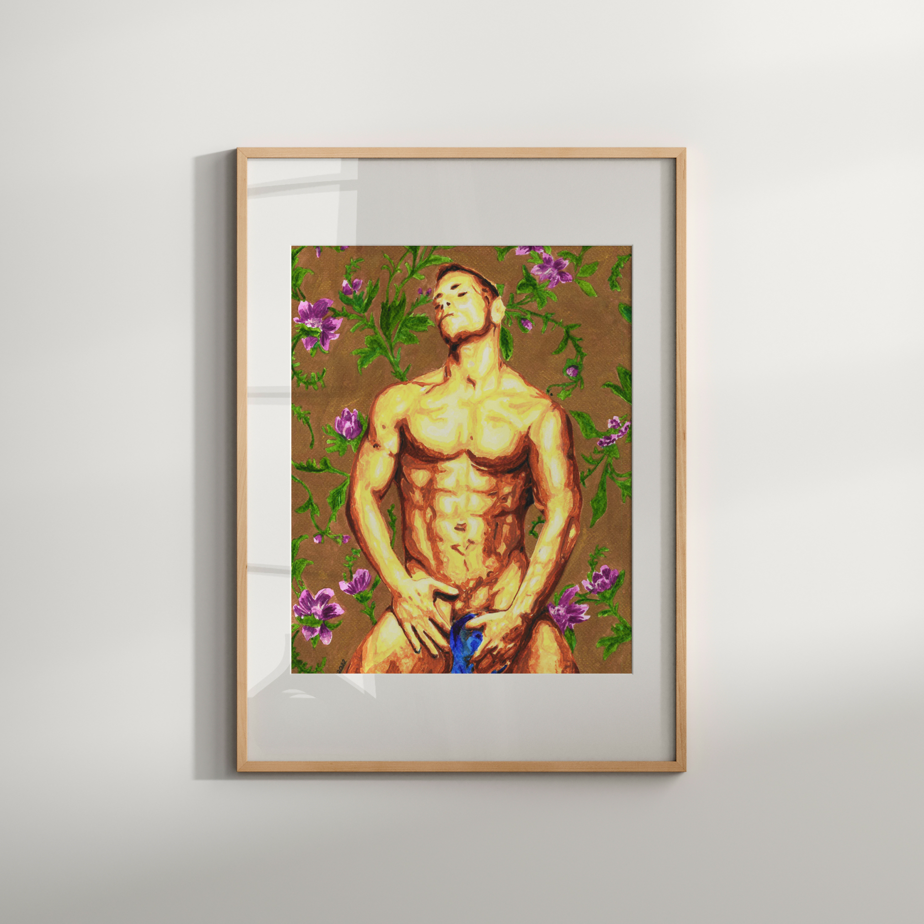 Framed artwork of a shirtless man with flowers on a plain wall