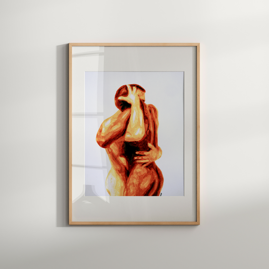 Framed artwork of a nude figure on a white wall