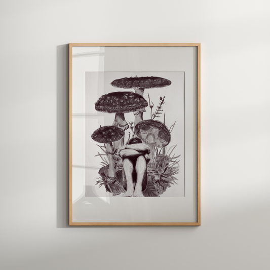 Framed artwork of a person surrounded by mushrooms on a white wall