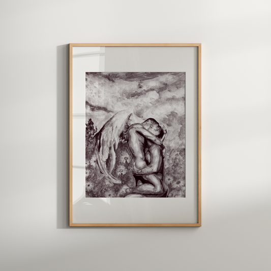 Framed black and white artwork of a nude figure on a plain wall