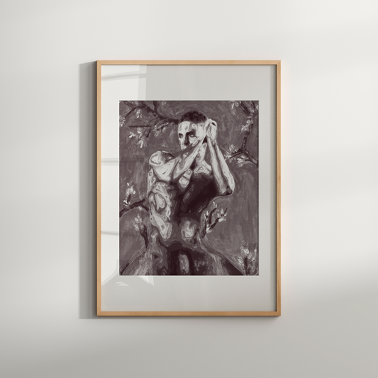 Framed artwork of a nude figure on a white wall