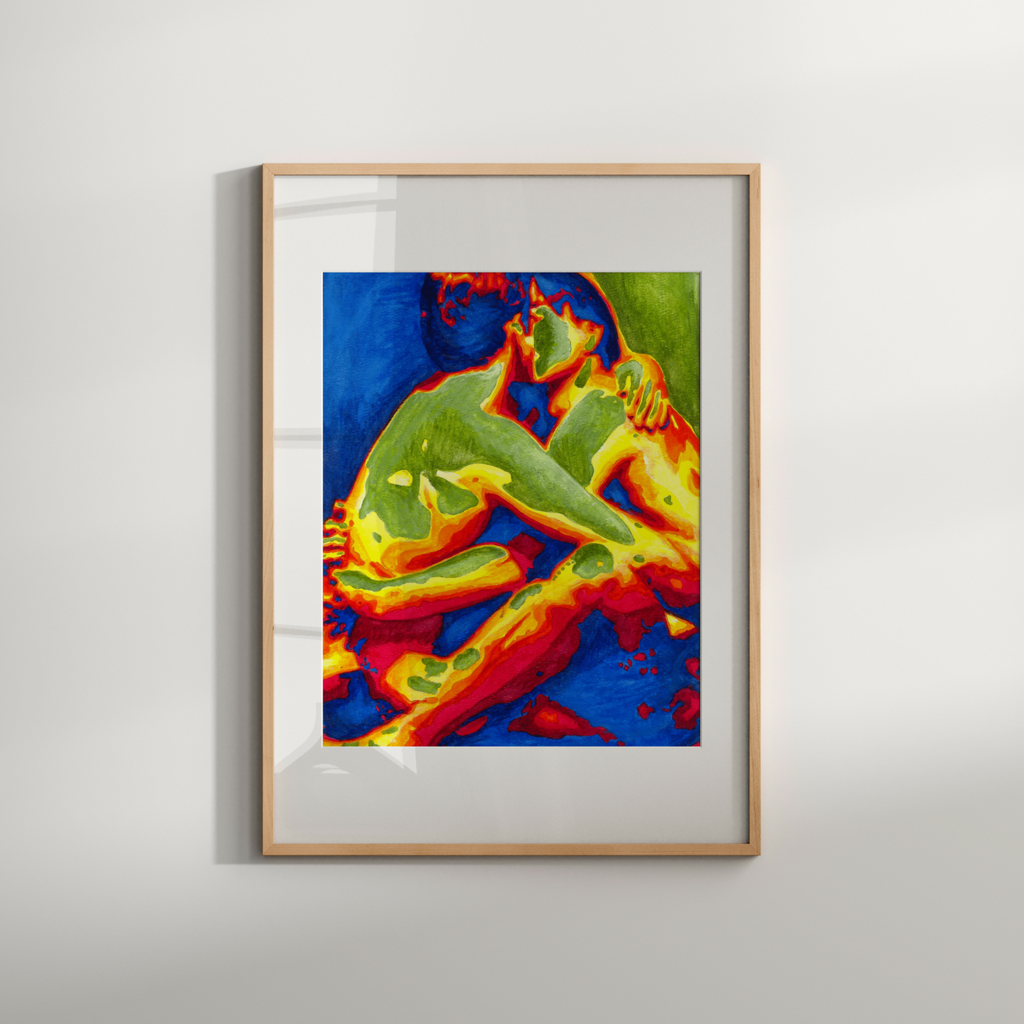 Framed abstract artwork with vibrant colors on a white wall