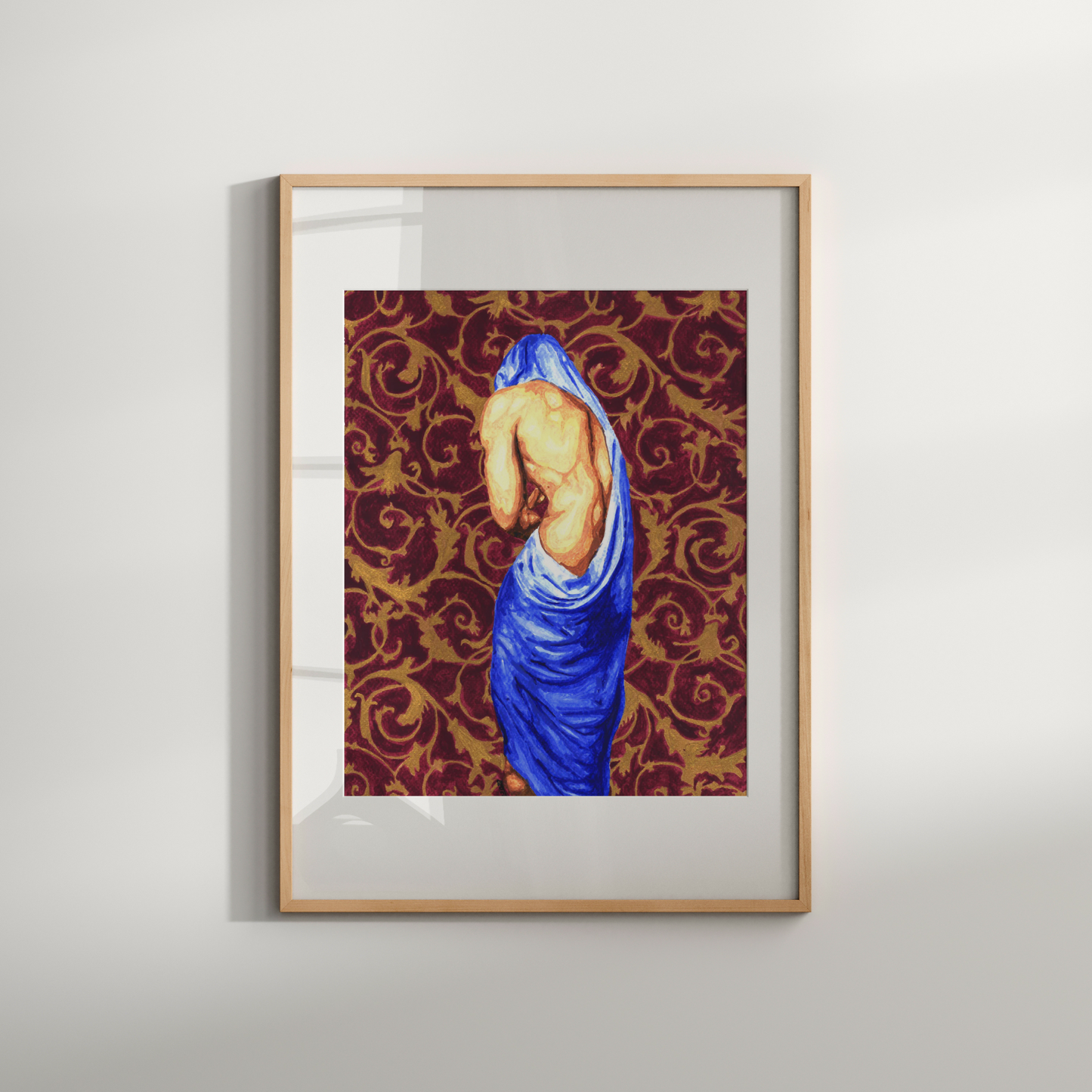Framed artwork of a draped figure on a patterned background