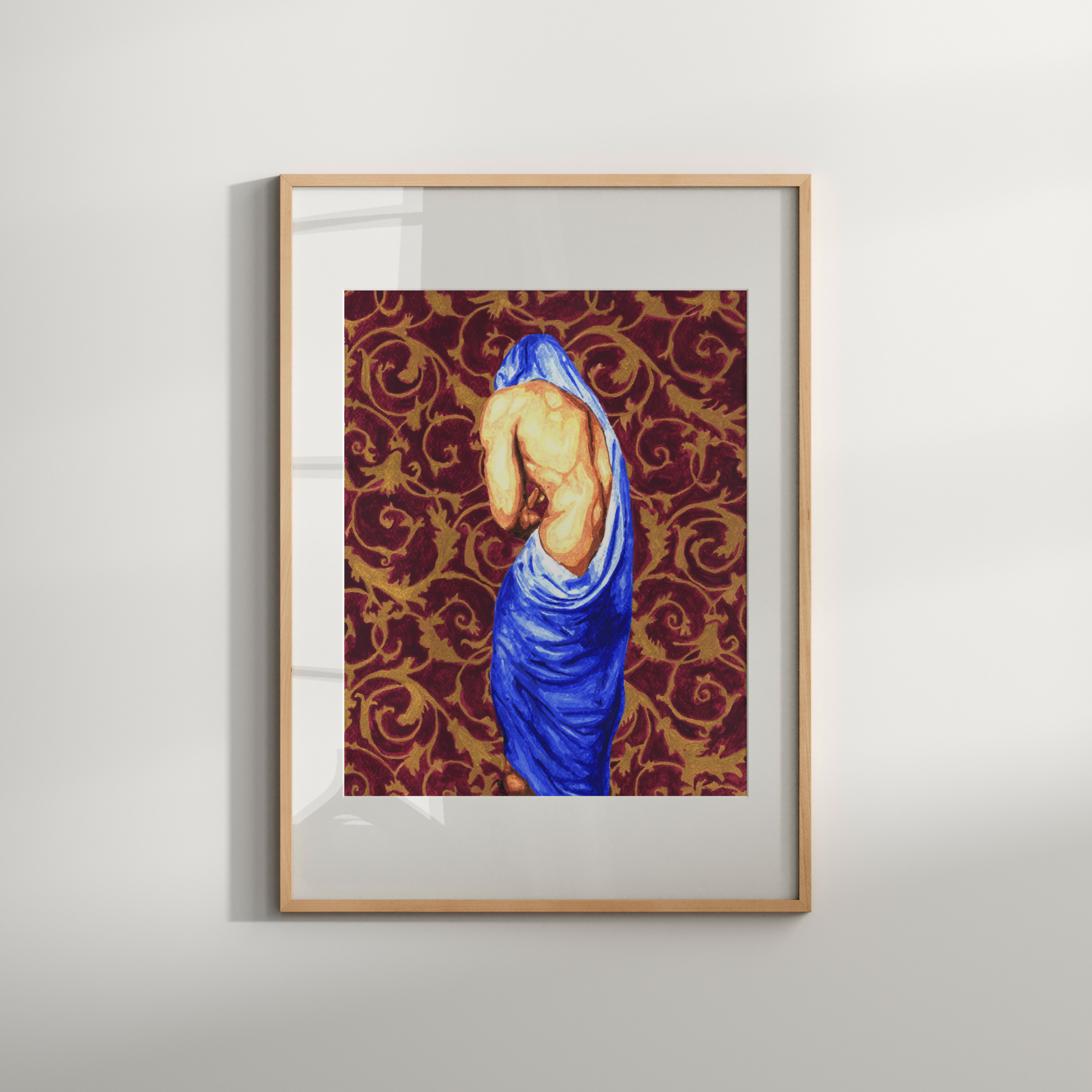Framed artwork of a draped figure on a patterned background