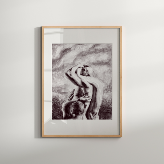 Framed artwork of a nude figure on a white wall