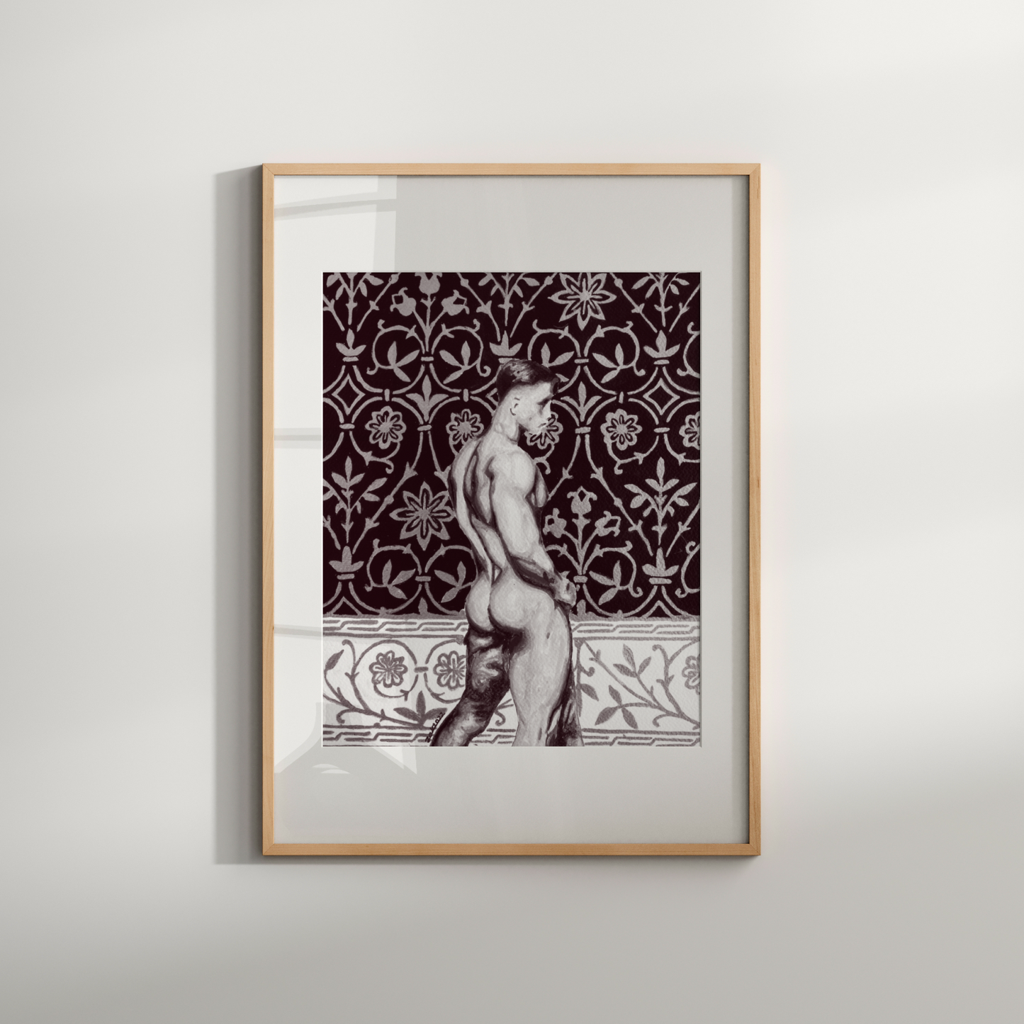 Framed artwork of a classical statue against a decorative patterned wall on a light gray background