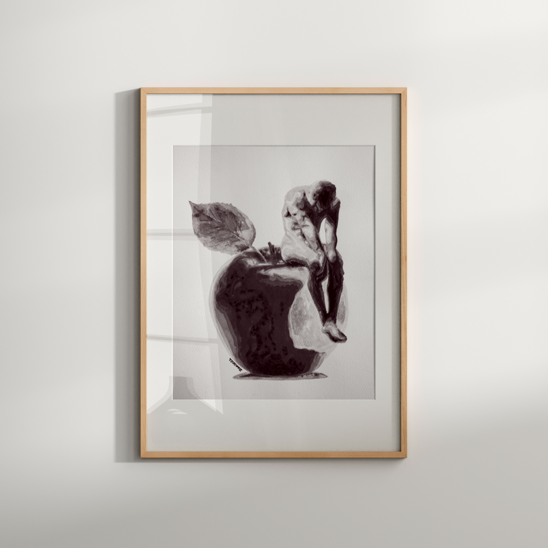 Framed black and white artwork of a cat and dog on a white wall