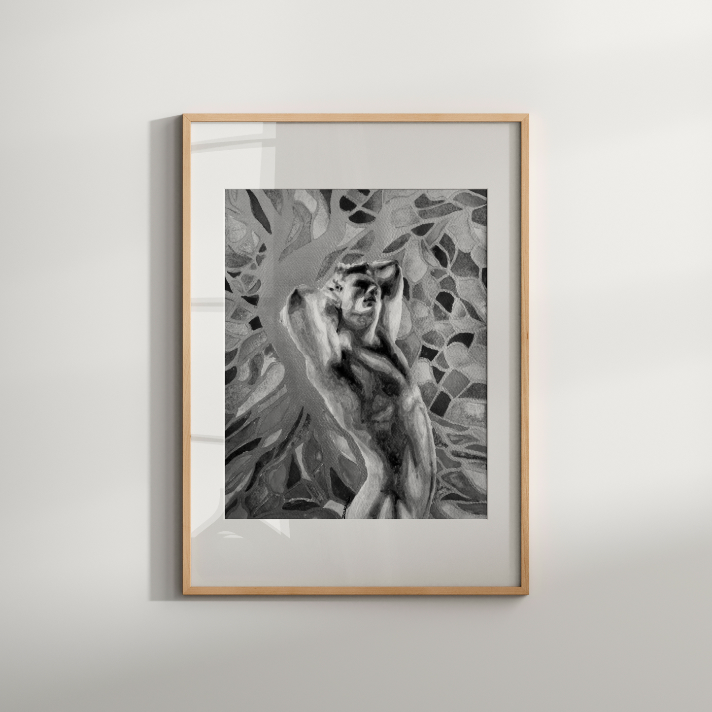 Framed black and white artwork of a woman with her hands over her ears on a light gray wall.