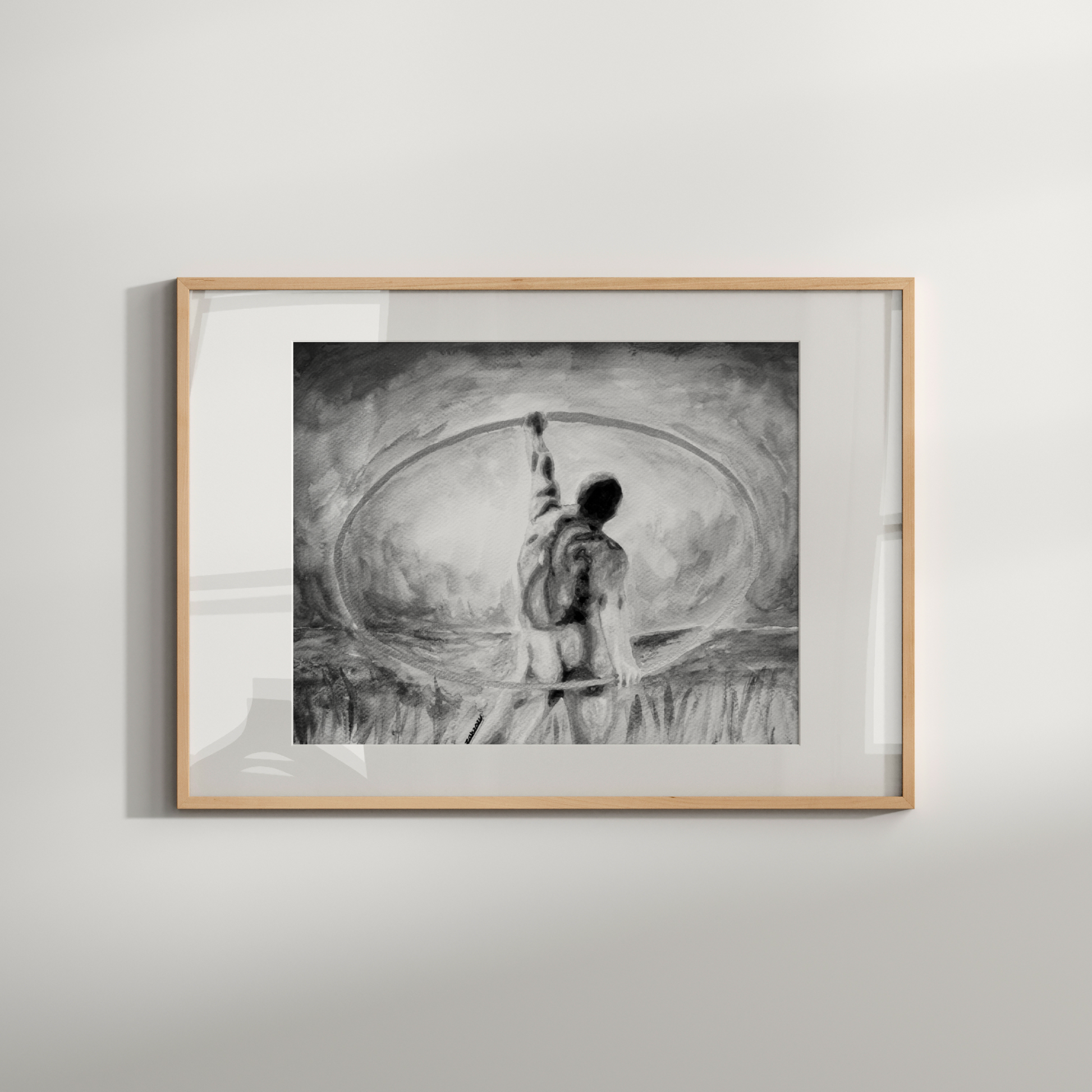 Framed black and white artwork of a person with a bow and arrow on a light gray wall.
