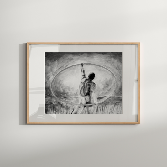 Framed black and white artwork of a person with a bow and arrow on a light gray wall.