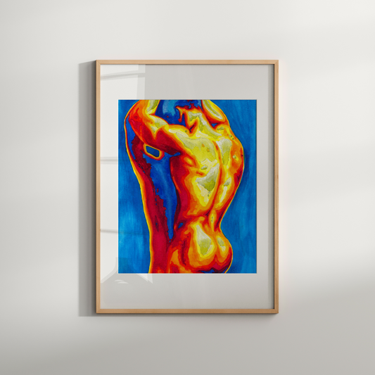 Framed abstract artwork with fiery colors on a white wall