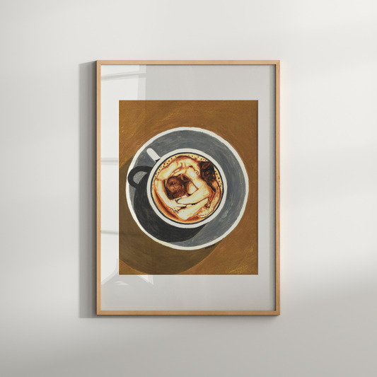 Framed artwork of a coffee cup on a wooden surface with a white background