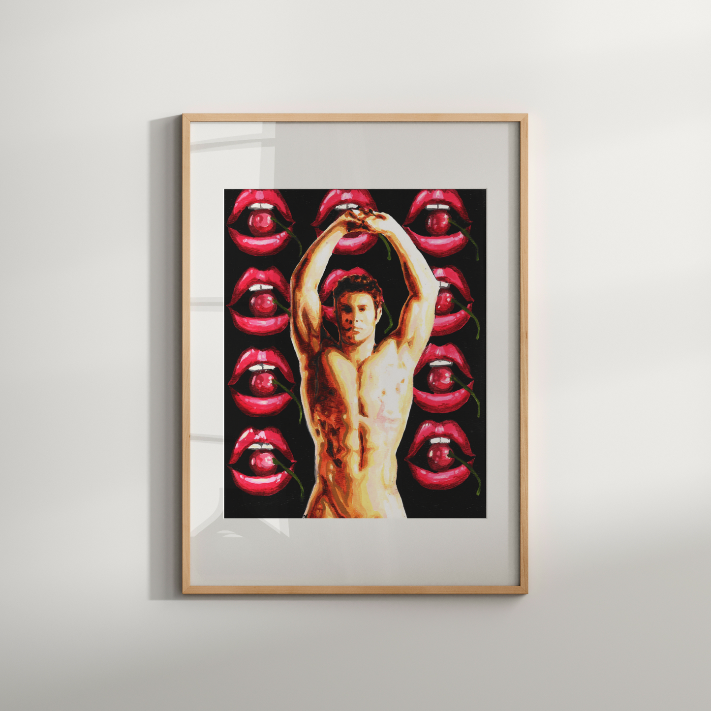 Framed artwork with a central figure and red lips on a white wall