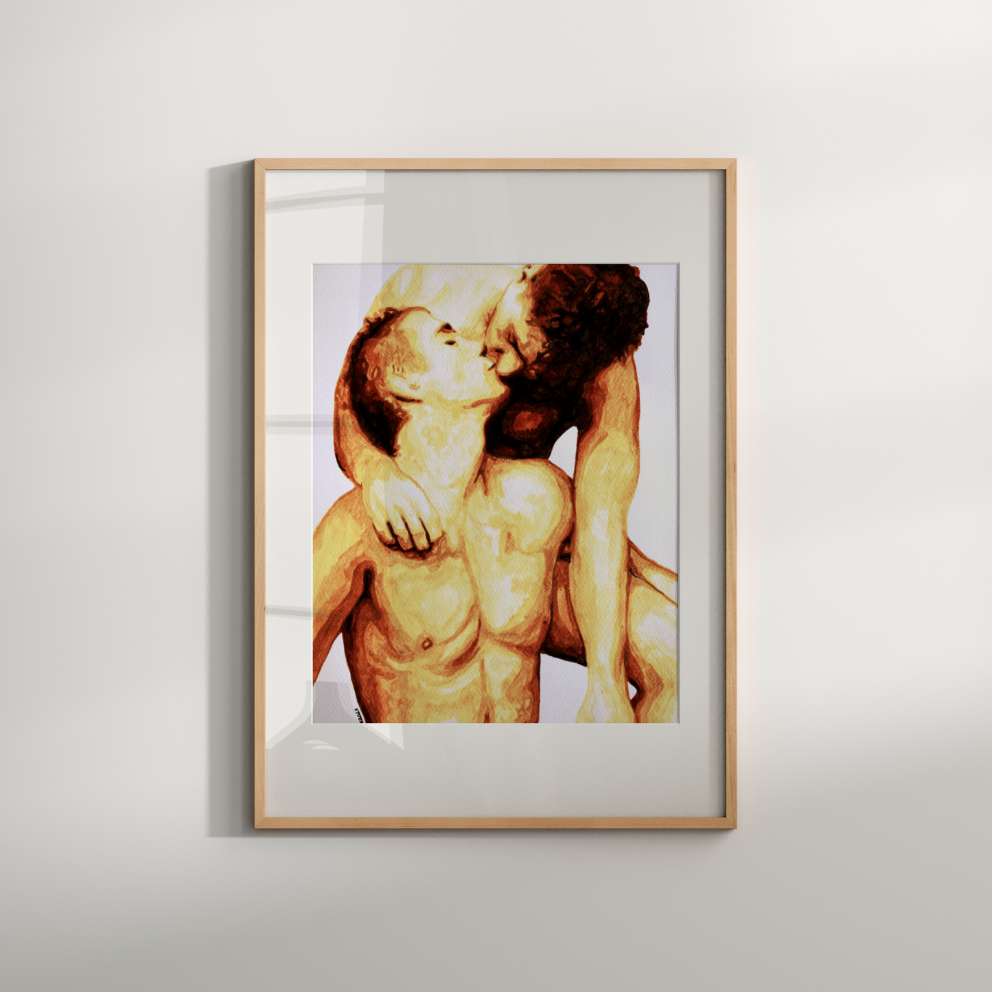 Framed artwork of two people embracing on a light gray background