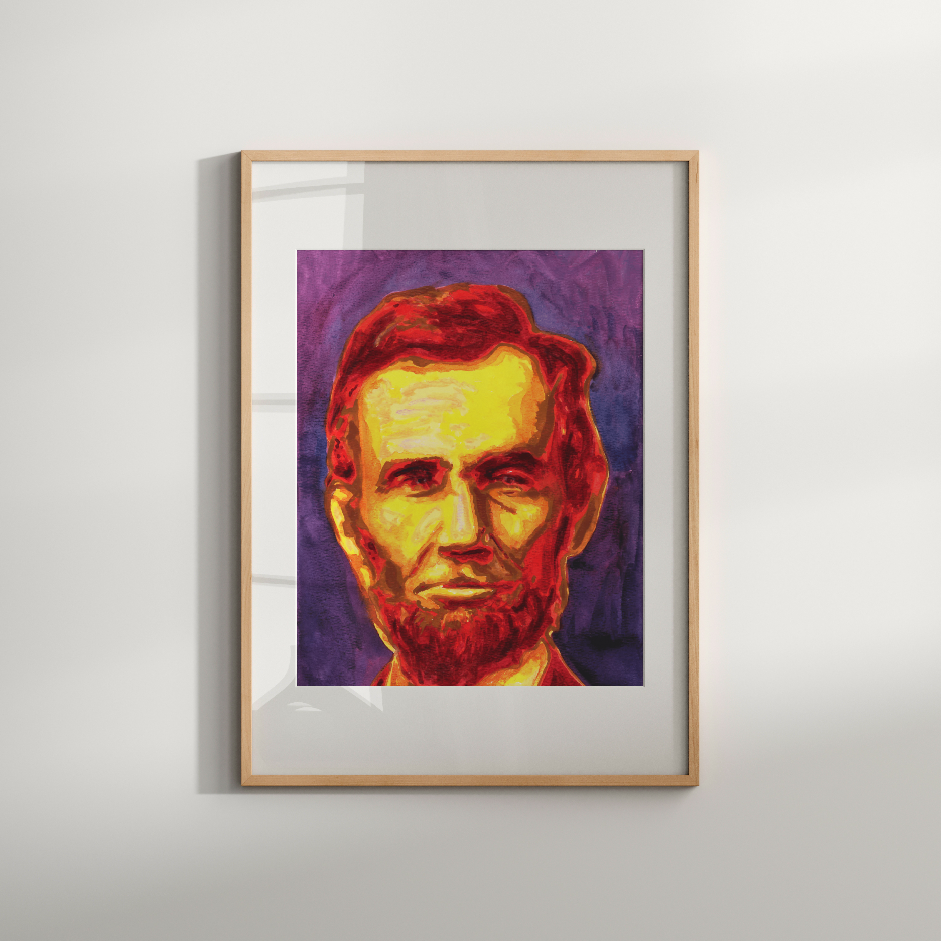 Framed portrait of a historical figure on a plain wall