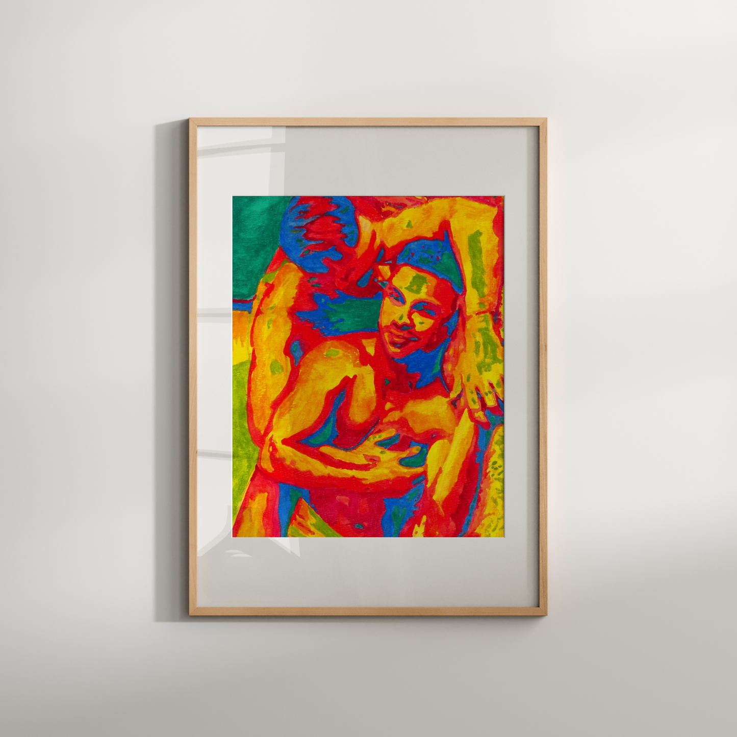 Framed colorful artwork of gay couple kissing on a white wall