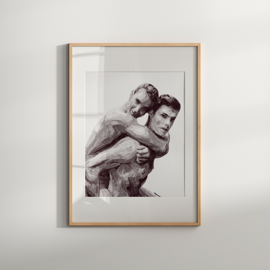 Framed artwork of two embracing figures on a white wall