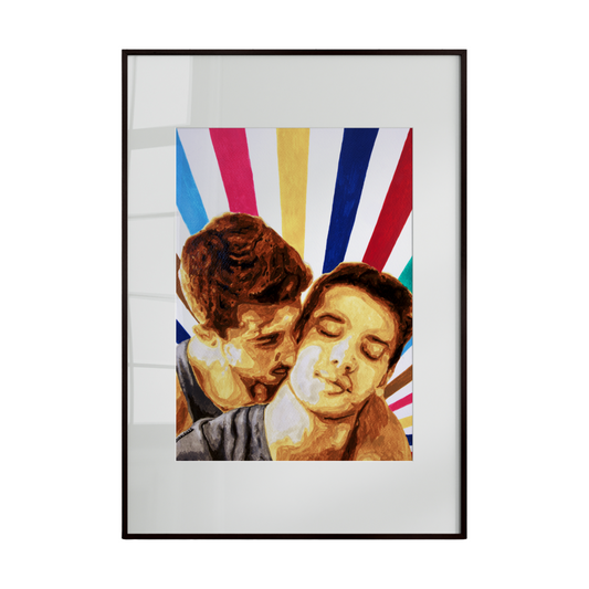 Framed artwork of two people embracing with a colorful abstract background