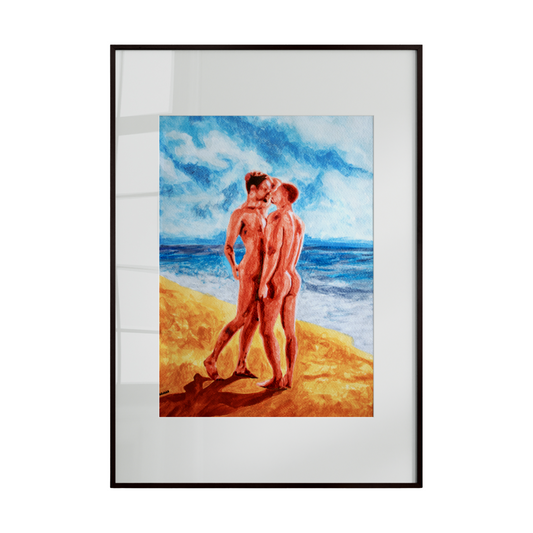 Framed artwork of two people embracing on a beach with a blue sky.