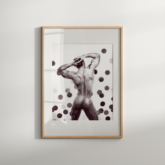 Framed artwork of a nude figure with polka dots on a light gray wall