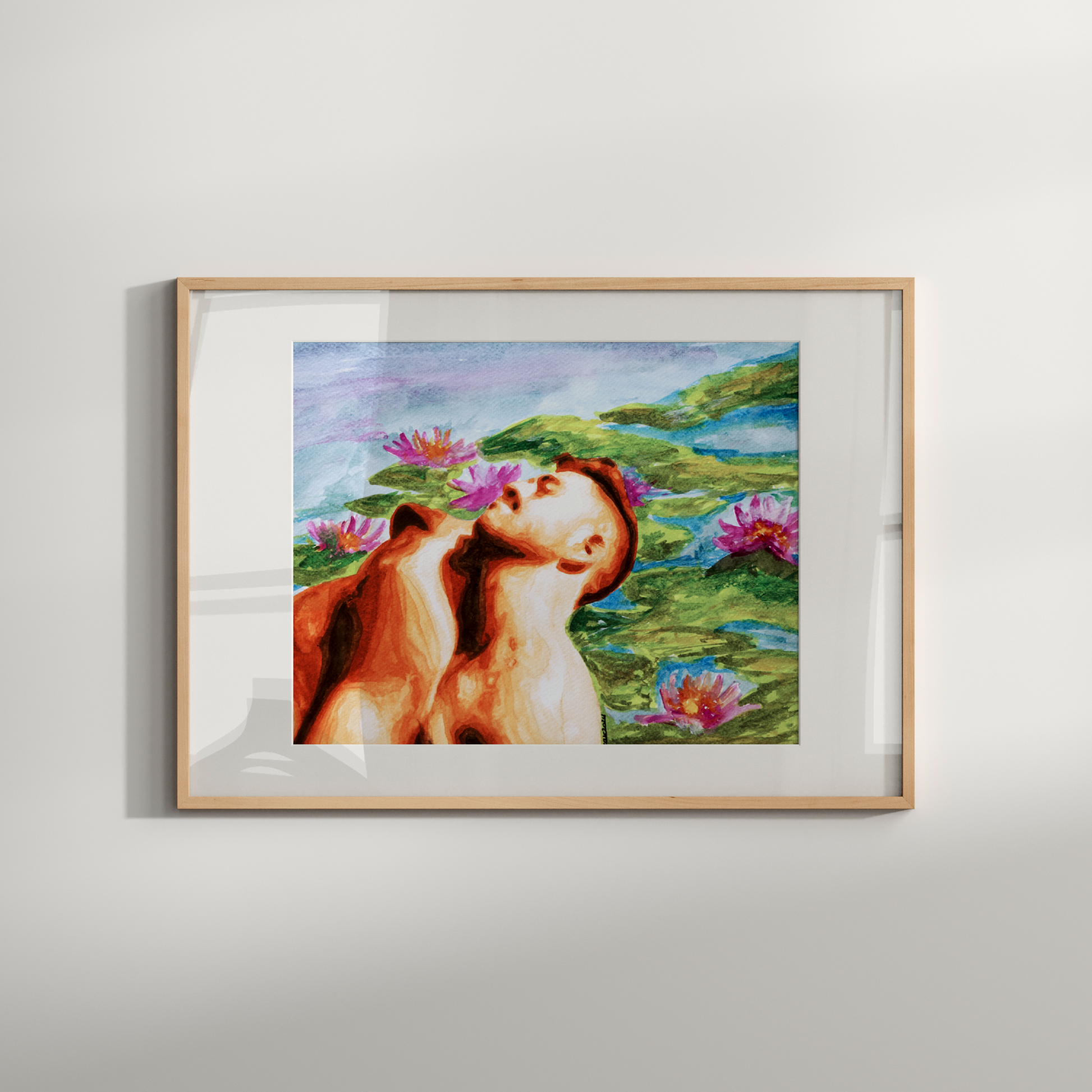 Framed artwork of a nude figure in a natural setting with flowers on a white wall.