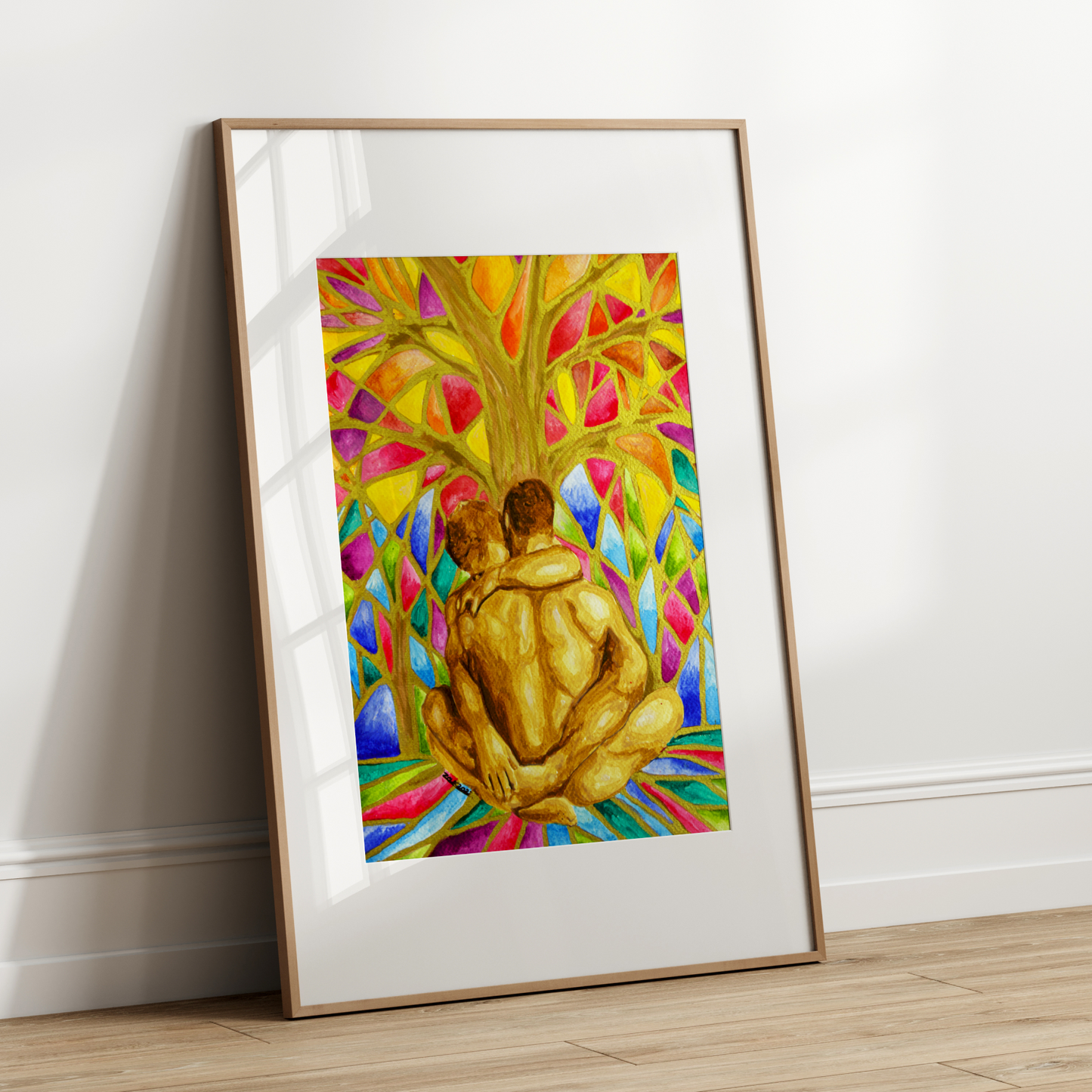Framed colorful artwork of two people sitting under a tree on a white wall.