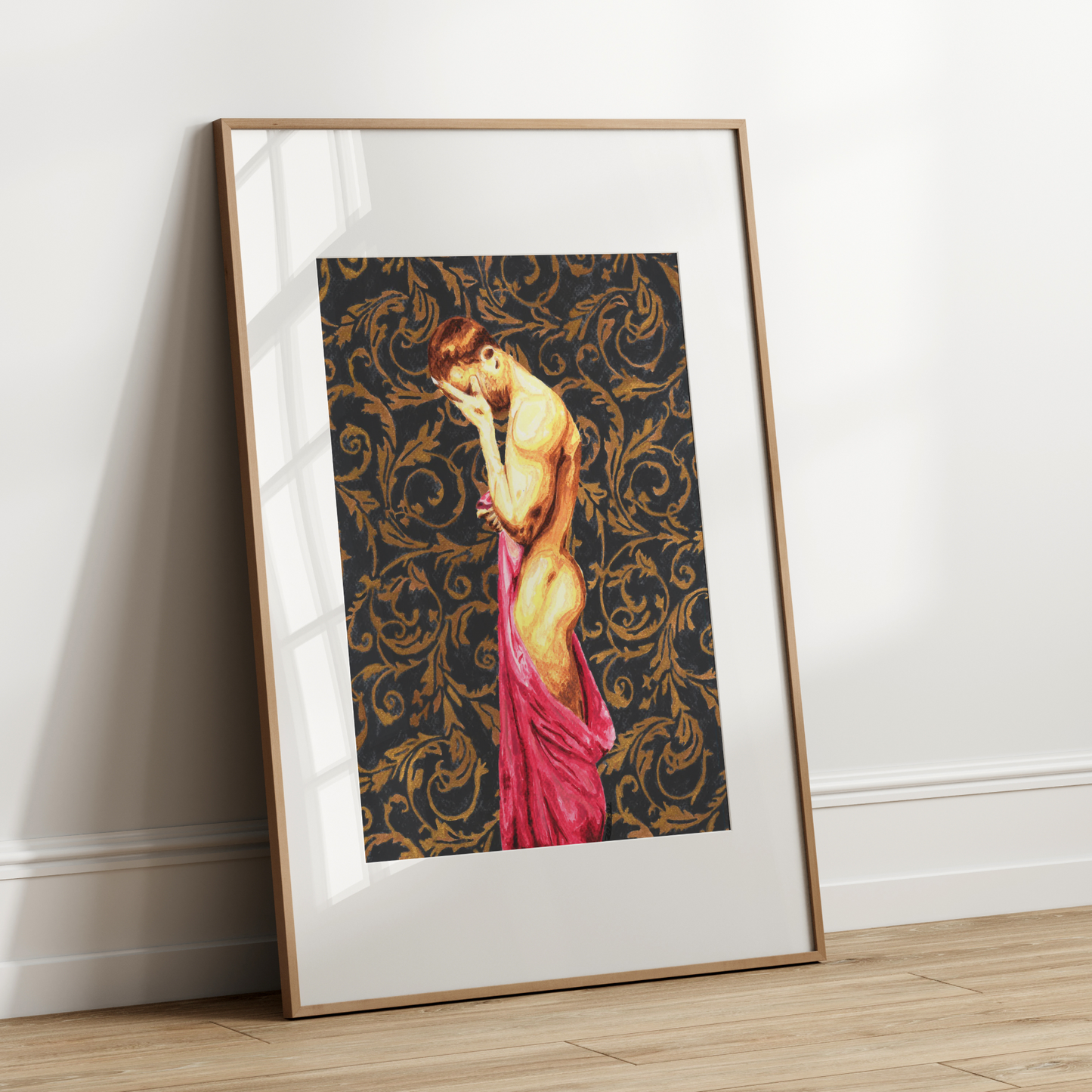 Framed artwork of a woman in a pink dress against a decorative patterned background on a white wall.