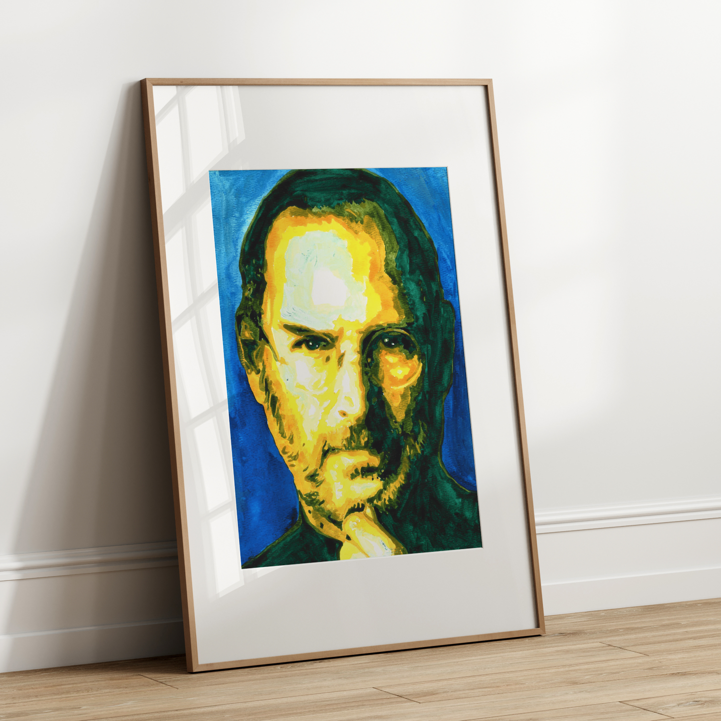 Framed portrait of a person leaning against a white wall.