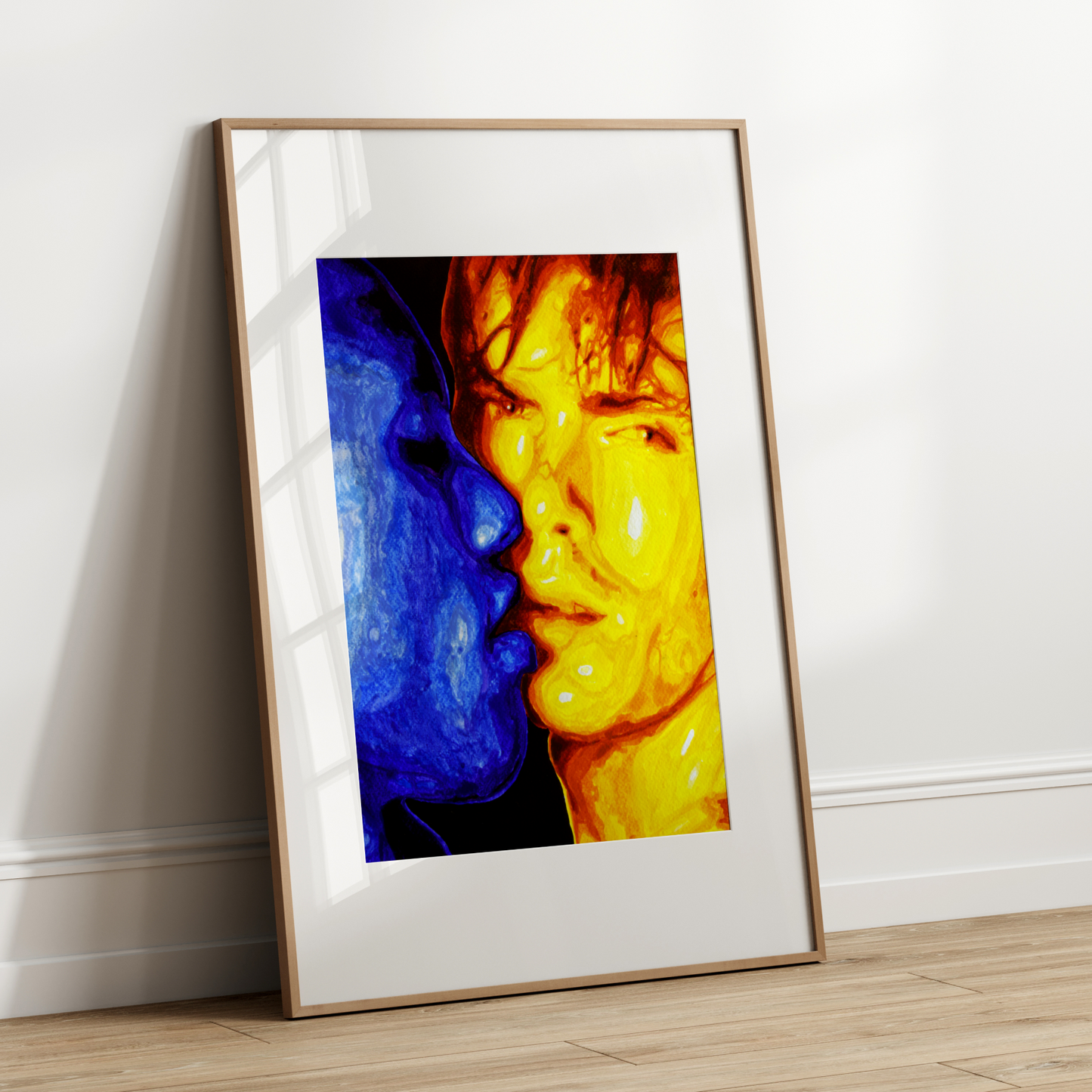 Framed abstract art print on a white wall