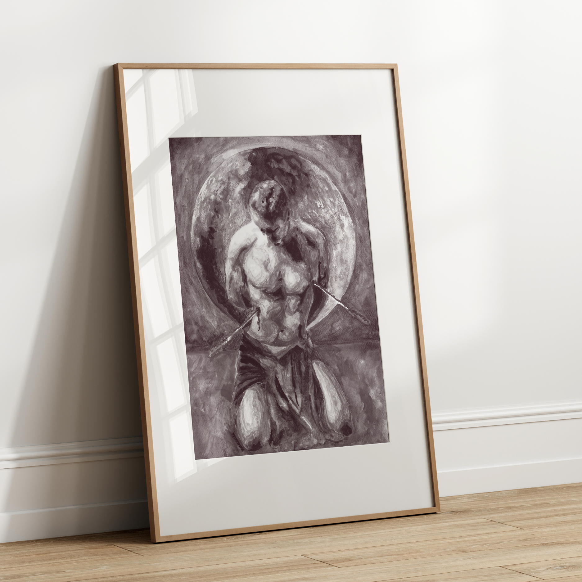 Framed artwork of a classical figure leaning against a white wall.